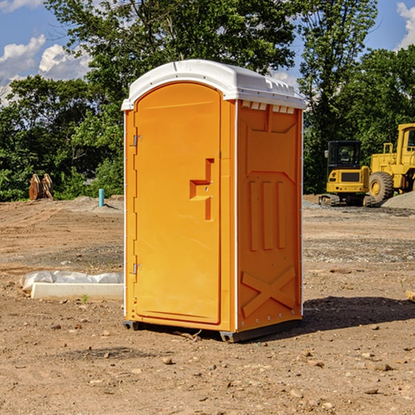 how often are the porta potties cleaned and serviced during a rental period in Paw Paw Lake Michigan